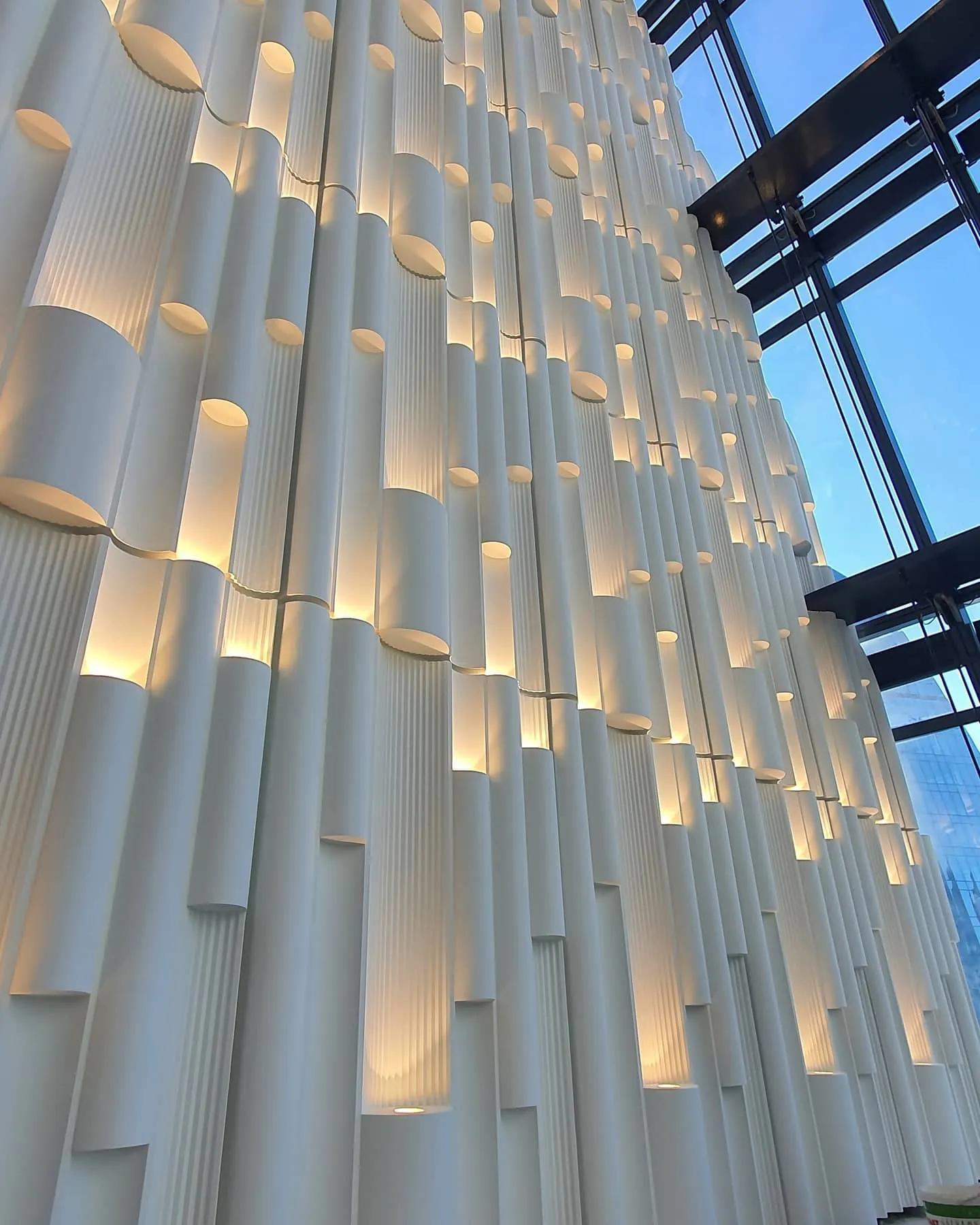 Interior GRC wall cladding with sculpted fins